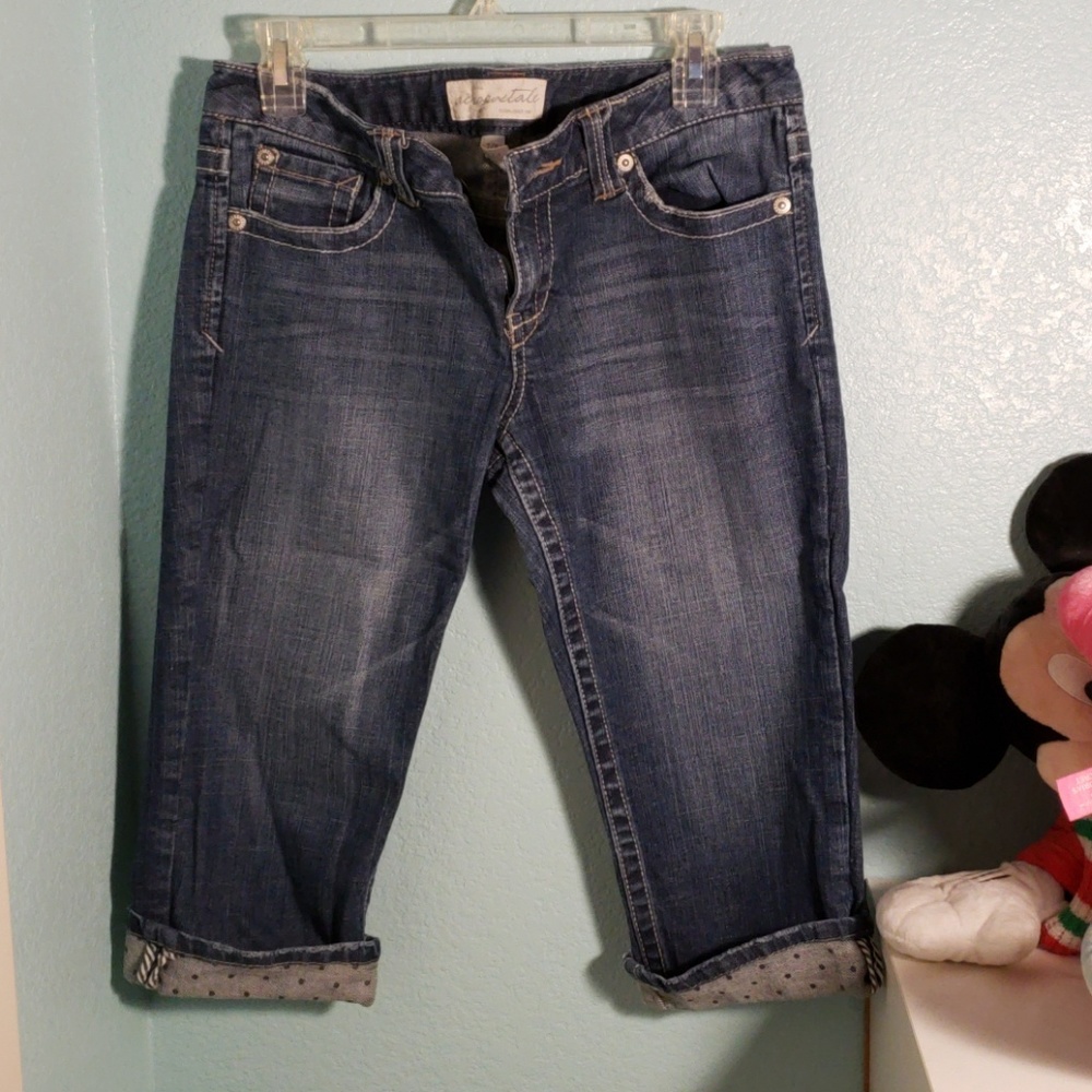 Denim capris with polka dot prints at the fold